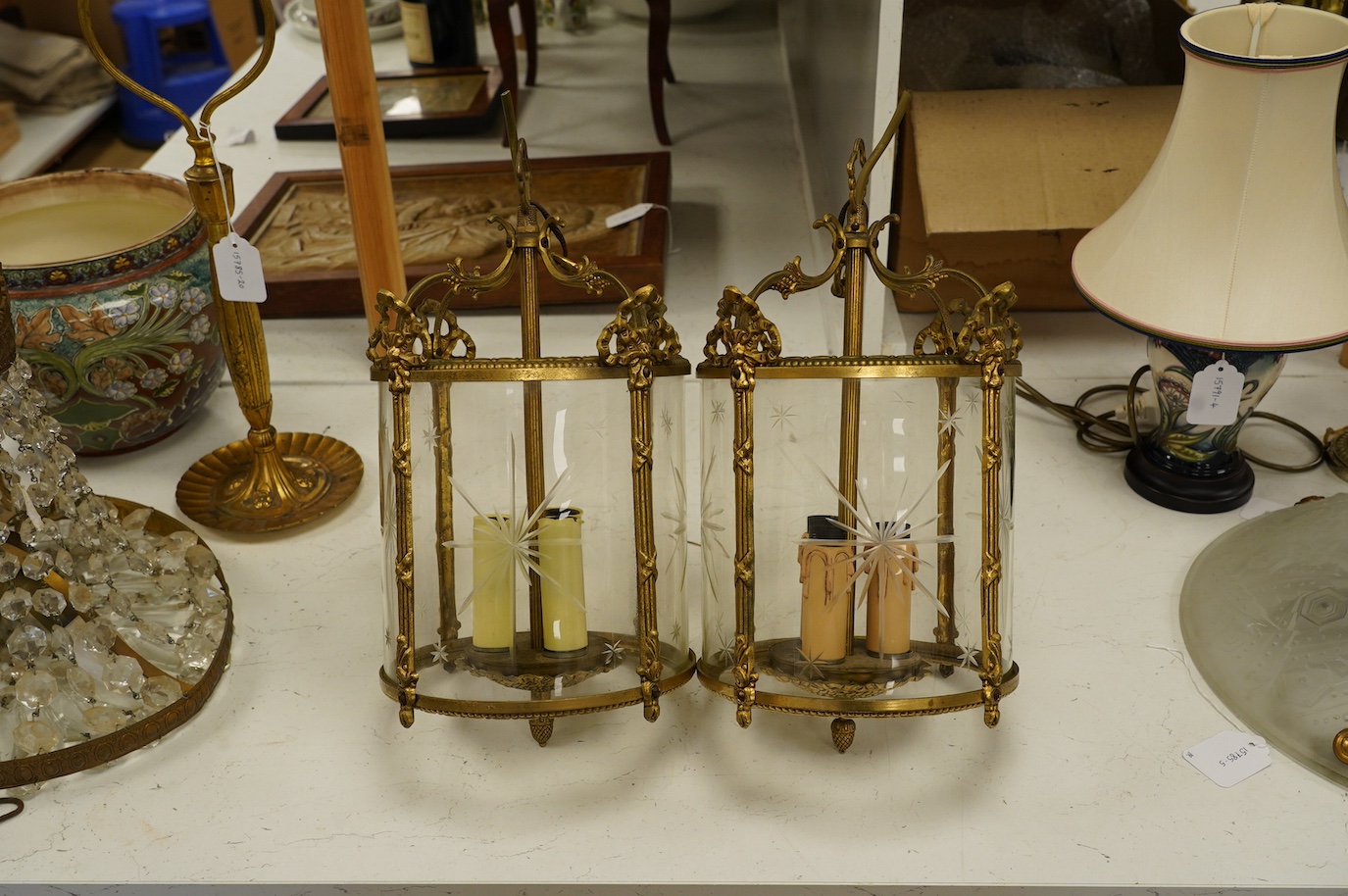 A pair of Louis XVI style gilt metal hall lanterns, 40cm high. Condition - fair to good